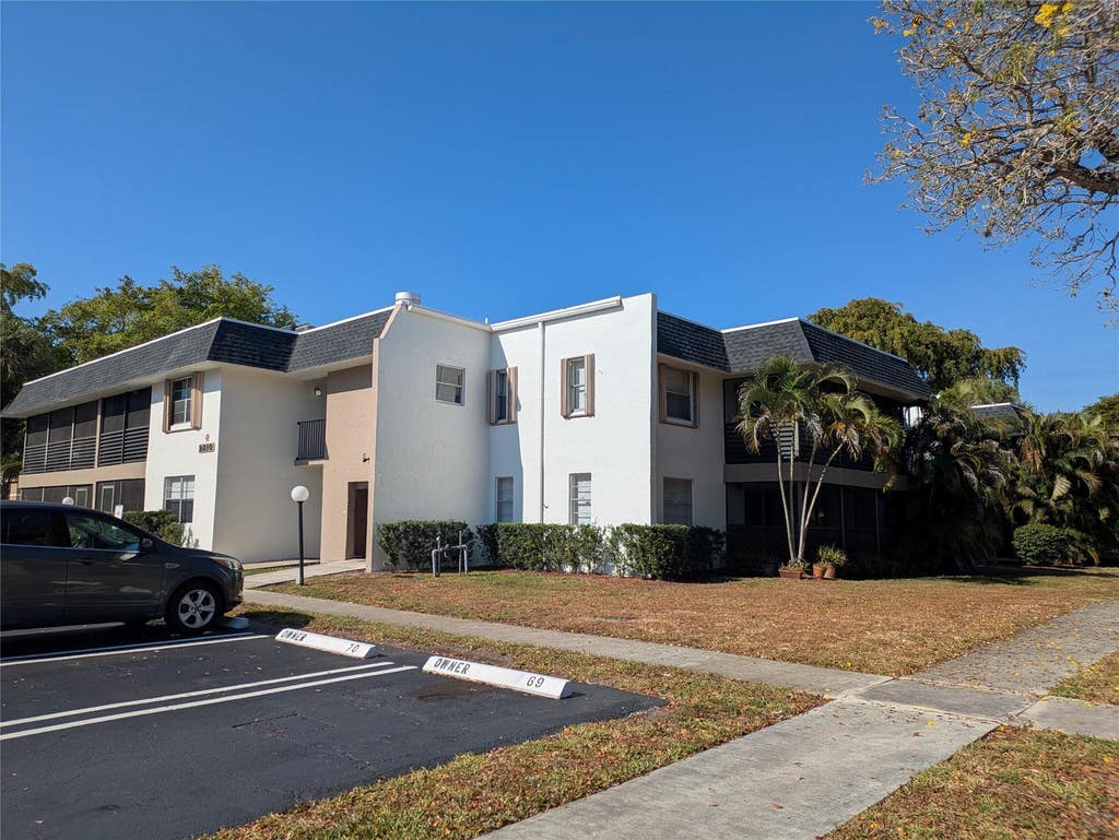 Photo of 2810 Riverside Drive #106-a, Coral Springs, FL 33065 (MLS # B26045603)