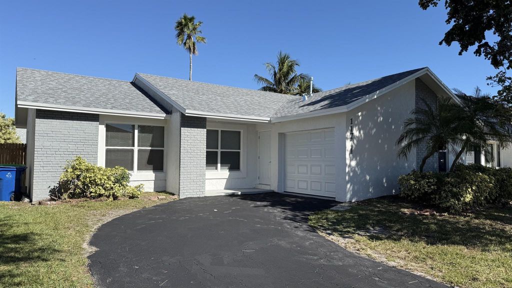 Photo of 11771 NW 37 Street, Sunrise, FL 33323 (MLS # R11083177)