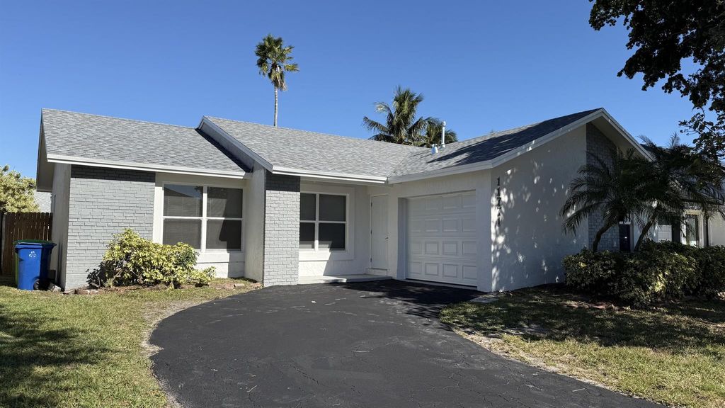 Photo of 11771 NW 37 Street, Sunrise, FL 33323 (MLS # R11083177)