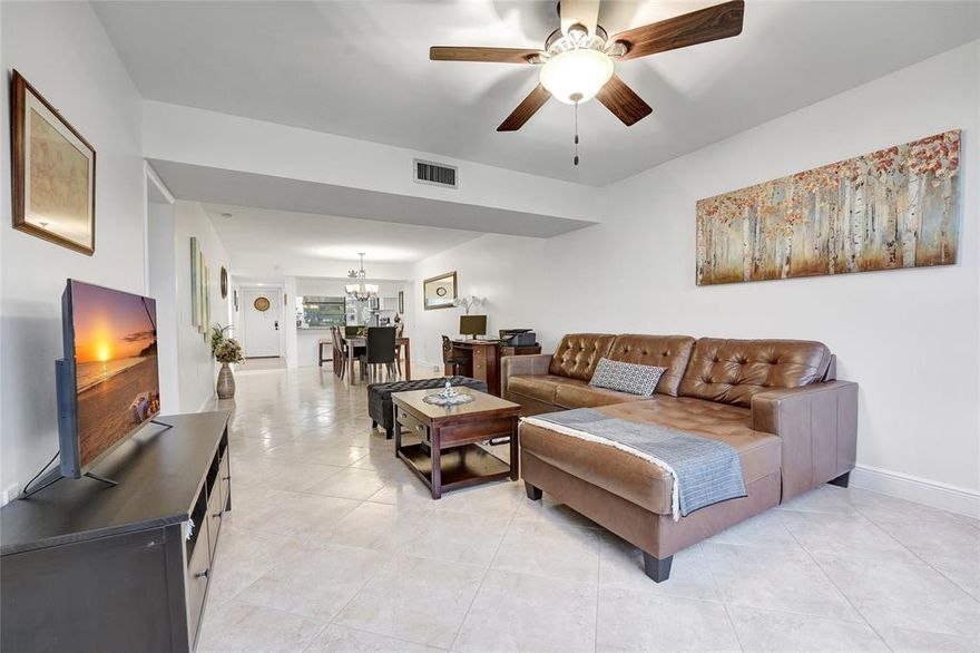 Captivating and fully upgraded 2-bedroom, 2-bathroom corner unit in the desirable Pine Island Ridge community of Davie. Upon entering, you are welcomed by beautiful tile flooring that flows seamlessly throughout the home, enhancing the open living space and complementing the serene golf course views.The renovated kitchen features granite countertops, stainless steel appliances, and timeless cabinetry. Both bathrooms have been tastefully updated with modern fixtures and finishes. An additional bonus room provides the perfect space for a home office, guest room, or hobby area.Pine Island Ridge offers outstanding amenities, including a majestic clubhouse and a nearby pool, both just a short walk from the condo.Excellent schools in the area and Close to highways. Upgraded 2-bedroom, 2-bathroom corner unit in the desirable Pine Island Ridge community of Davie, with excellent schools. Upon entering, you are welcomed by beautiful tile flooring that flows seamlessly throughout the home, enhancing the open living space and complementing the serene golf course views.The renovated kitchen features granite countertops, stainless steel appliances, and timeless cabinetry. Both bathrooms have been tastefully updated with modern fixtures and finishes. An additional bonus room provides the perfect space for a home office, guest room, or hobby area.Pine Island Ridge offers outstanding amenities, including a majestic clubhouse and a nearby pool, both just a short walk from the condo.Excellent schools in the area and Close to highways.