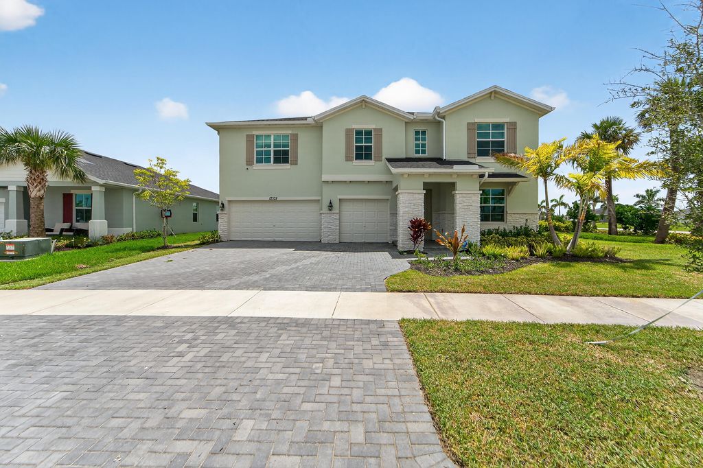 Photo of 12328 SW Roma Circle, Port Saint Lucie, FL 34987 (MLS # R11163599)
