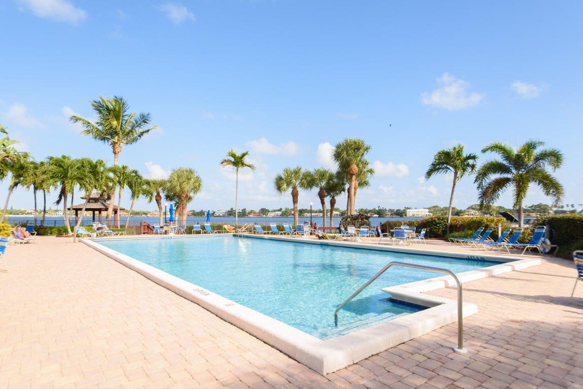 WELL MAINTAINED HALF MOON BAY OFFERS SECURE GATE,TWO POOLS,HOT TUB, TENNIS,SAUNA,BEAUTIFUL LANDSCAPE AND OUTSTANDING INTERCOASTAL VIEWS.THIS OVER 1400 SF LIGHT 2/2 UNIT HAS LOTS OF ROOM AND GREAT FLOOR PLAN.HUGE PRIVATE,COVERED BALCONY FACING SOUTH WITH PEACEFUL GARDEN VIEW.CLOSE TO SHOPPING AND I95.
