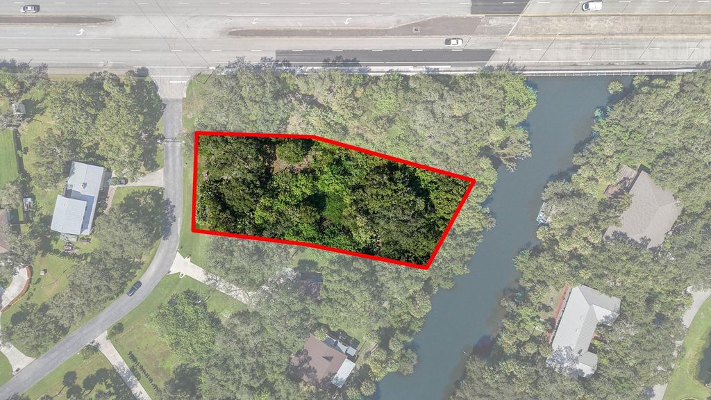 Photo of 2460 Sweetwater Drive, Fort Pierce, FL 34981 (MLS # R11125941)