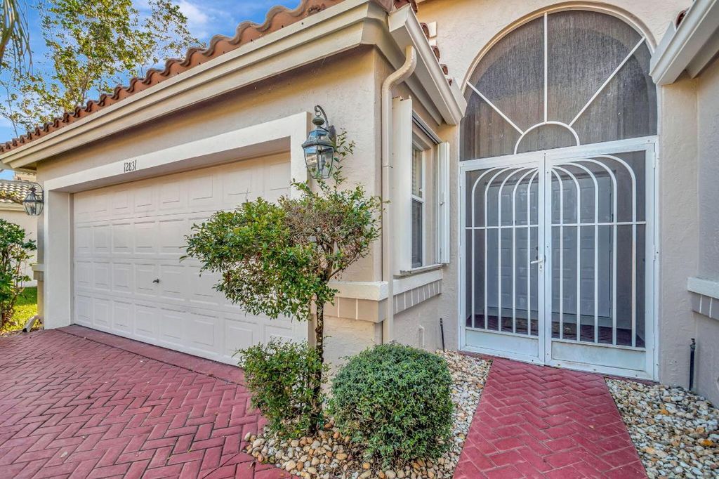 Photo of 12831 Coral Lakes Drive, Boynton Beach, FL 33437 (MLS # R11062964)