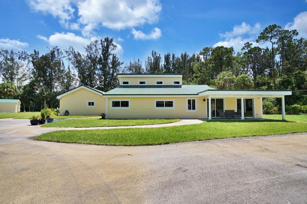 Photo of 8225 Pioneer Road, West Palm Beach, FL 33411 (MLS # R11045527)