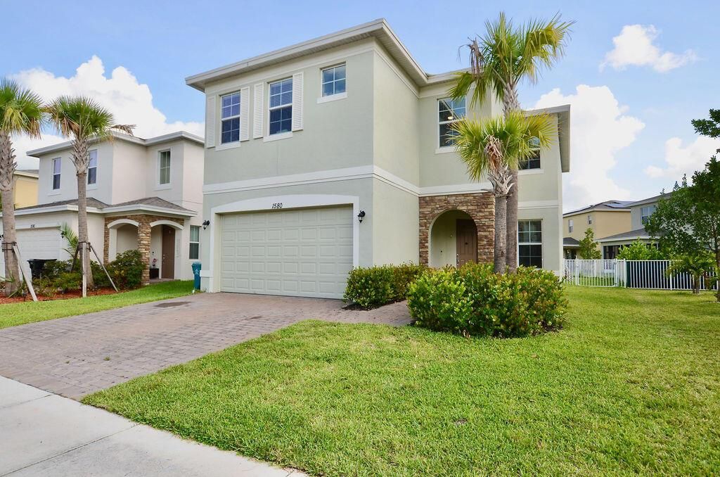 Photo of 1580 NW Cataluna Circle, Port St Lucie, FL 34986 (MLS # R10904298)