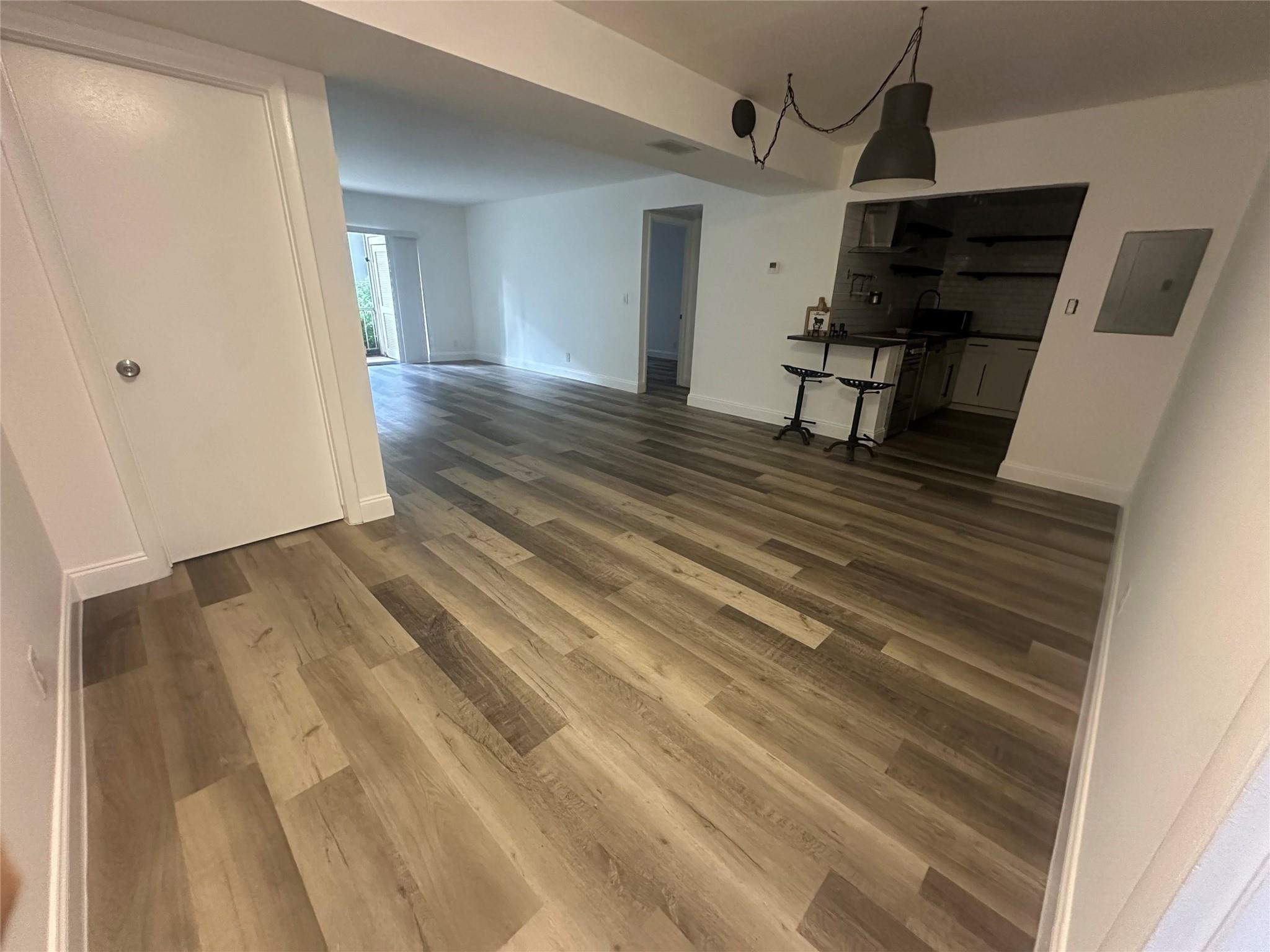 Spacious 2-bedroom, 2-bath condo in East Boca featuring updated bathrooms with modern tile, glass shower enclosures, and double vanities. Freshly painted with new flooring throughout and a bright living area that opens to a private patio with garden views. Conveniently located near FAU, Boca Regional Hospital, Mizner Park, Town Center Mall, and just minutes to the beach. Community amenities include pool and green spaces.