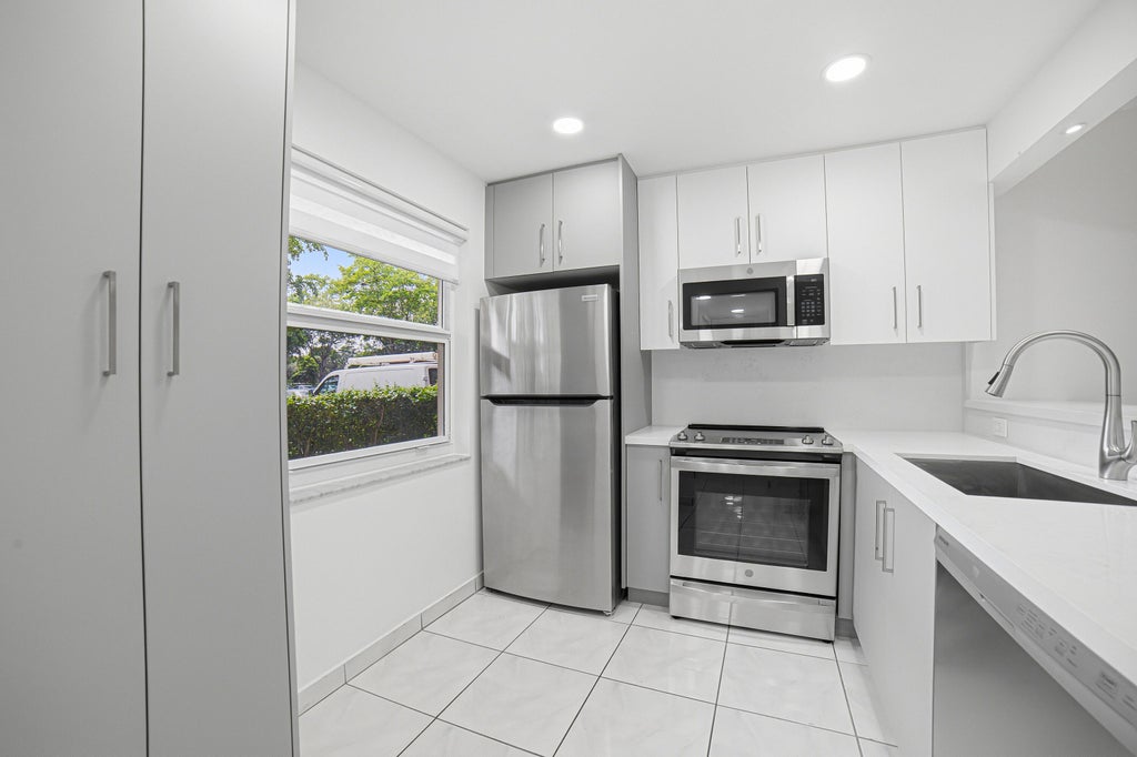 Photo of 3121 NW 47TH Avenue #109, Lauderdale Lakes, FL 33319 (MLS # B26089510)