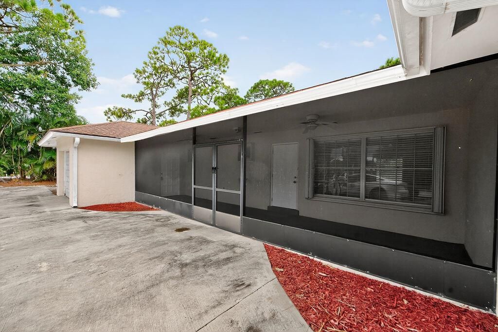 Photo of 14965 Palmwood Road, Jupiter, FL 33458 (MLS # R11123778)