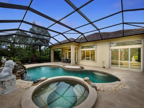 Photo of 9624 Crooked Stick Lane, Port Saint Lucie, FL 34986 (MLS # R11147394)