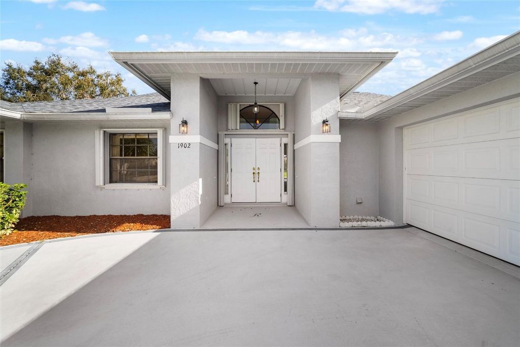 Photo of 1902 SE Gaskins Circle, Port Saint Lucie, FL 34952 (MLS # F10504191)