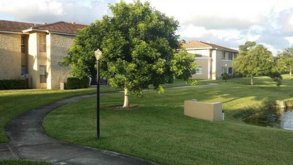 Photo of 99187 Twin Lakes Drive #9918, Coral Springs, FL 33071 (MLS # F10524470)