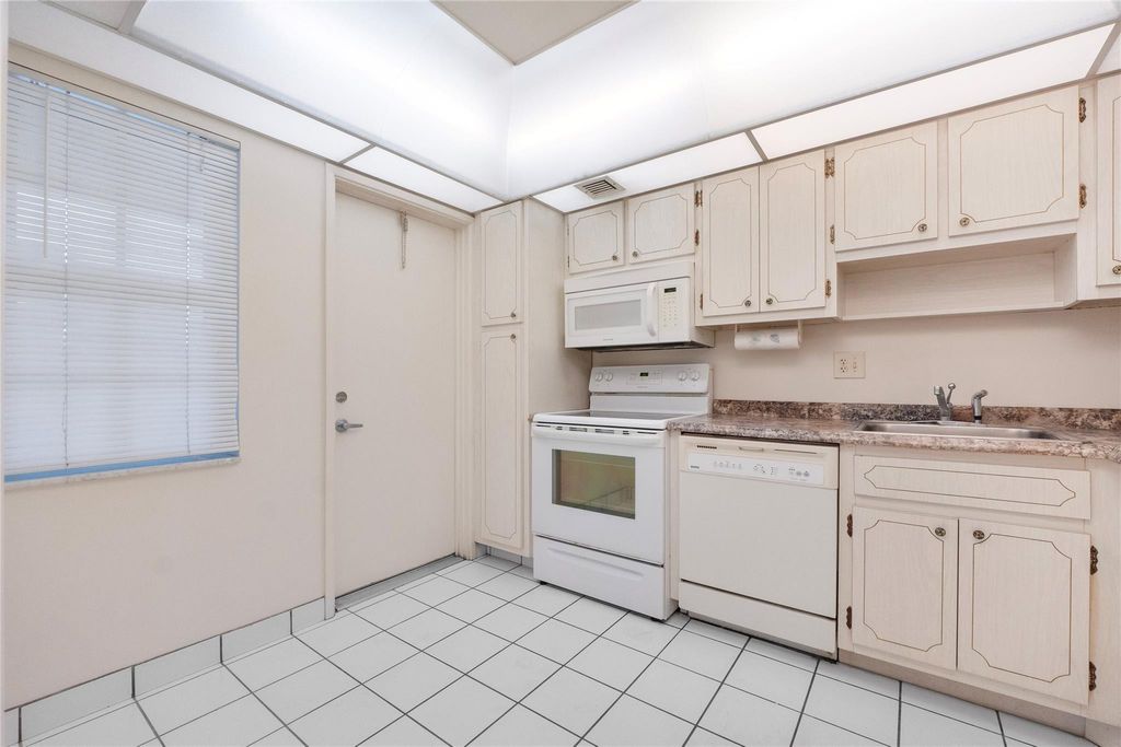 Photo of 2900 N Palm Aire Drive #303, Pompano Beach, FL 33069 (MLS # F10483307)