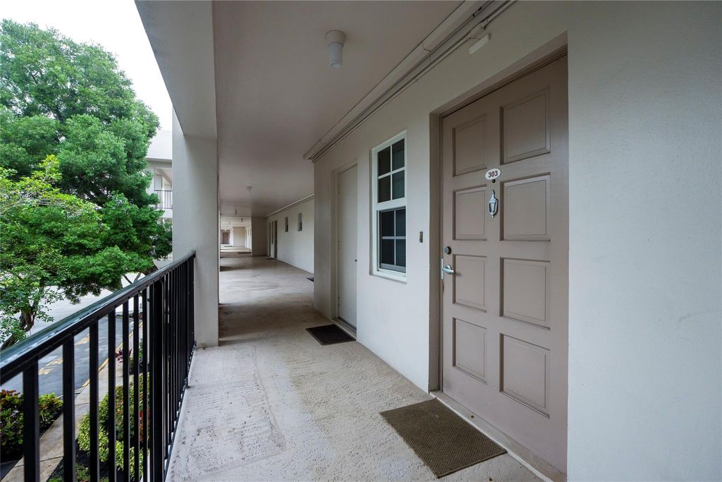 Photo of 2900 N Palm Aire Drive #303, Pompano Beach, FL 33069 (MLS # F10483307)