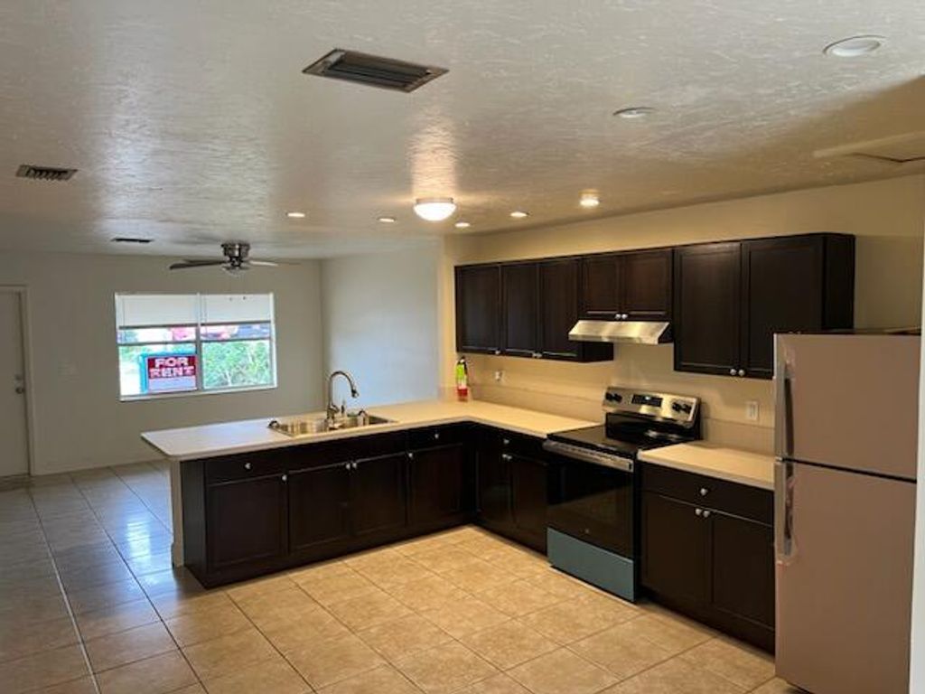 Photo of 4933 Saratoga Road, West Palm Beach, FL 33415 (MLS # R11051697)