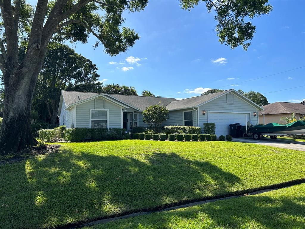 Photo of 2409 SW Lafayette Street, Port St Lucie, FL 34984 (MLS # R10888852)