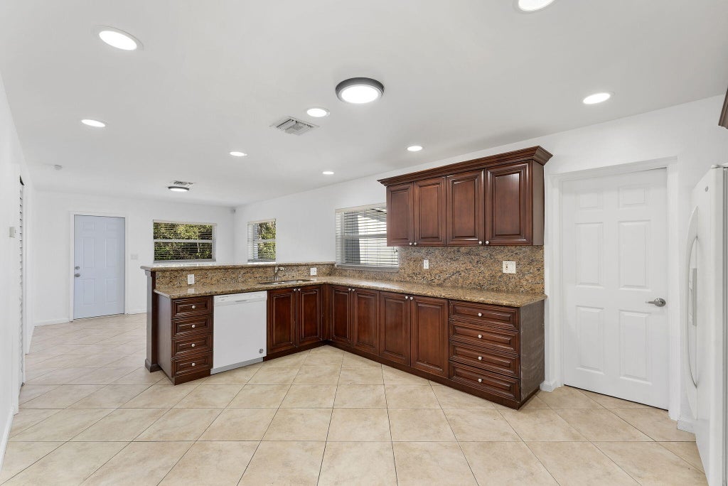 Photo of 105 NW 7th Court, Deerfield Beach, FL 33441 (MLS # B26081850)