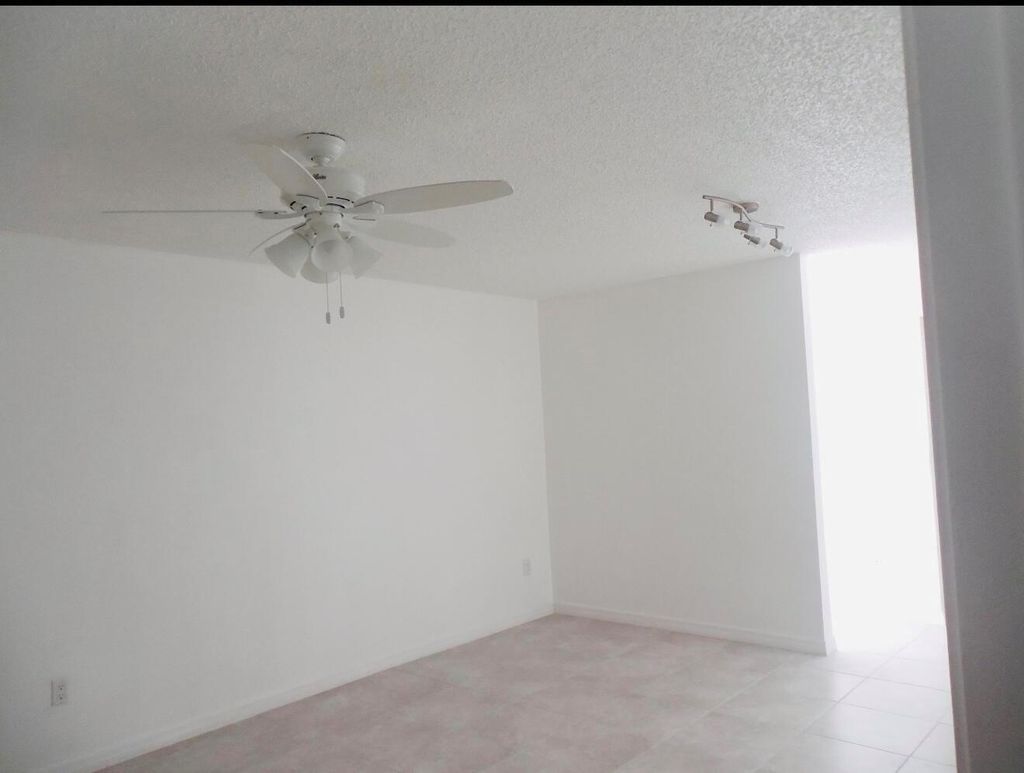 Photo of 614 SW Jeanne Street, Port Saint Lucie, FL 34953 (MLS # R11137370)