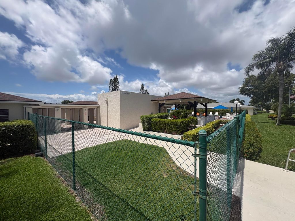 Photo of 1020 Silk Oak Terrace #104, Delray Beach, FL 33445 (MLS # B26030893)