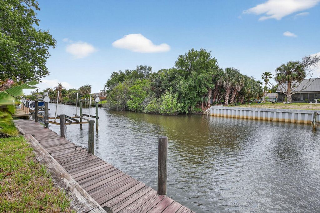 Photo of 320 NE Surfside Avenue, Port Saint Lucie, FL 34983 (MLS # R11158141)