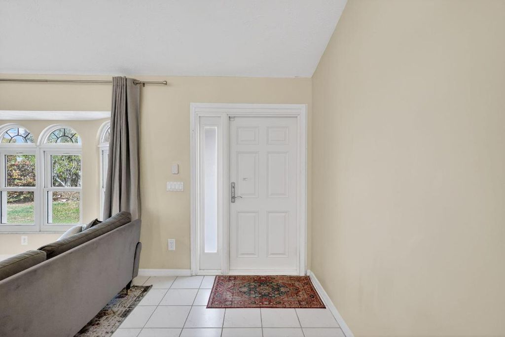 Photo of 320 NE Surfside Avenue, Port Saint Lucie, FL 34983 (MLS # R11158141)