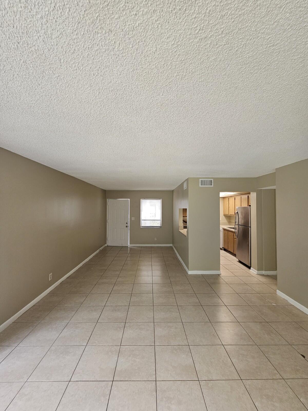 Well-maintained and spacious 1 bed + 1 bath first-floor condo in the heart of West Palm Beach! Freshly painted with tile flooring throughout, Newer stainless steel appliances, and a newer A/C unit for your comfort. Features a large walk-in closet and open layout, offering both style and convenience. Laundry room located on the same floor for added ease. Perfectly located walking distance to West Palm Beach Outlet, dining, and entertainment, and just minutes to I-95, Downtown, and the beaches. Enjoy comfortable living in a prime location close to everything you need!