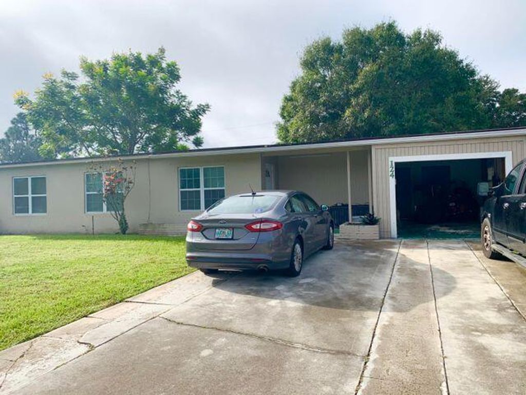 Photo of 124 SE Prima Vista Boulevard, Port Saint Lucie, FL 34983 (MLS # R10758032)