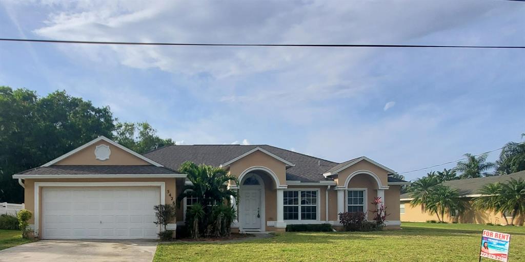 Photo of 5426 NW Briscoe Drive, Port Saint Lucie, FL 34986 (MLS # R10704236)