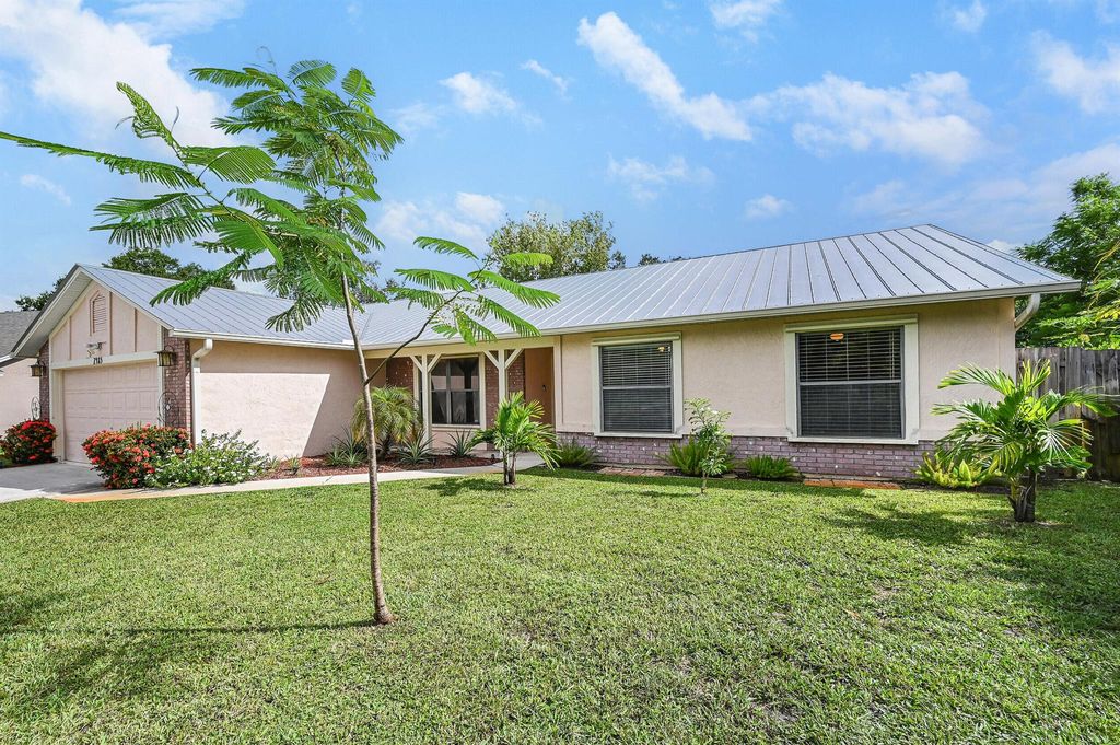 Photo of 2485 SE Tracy Avenue, Port Saint Lucie, FL 34952 (MLS # R11063115)