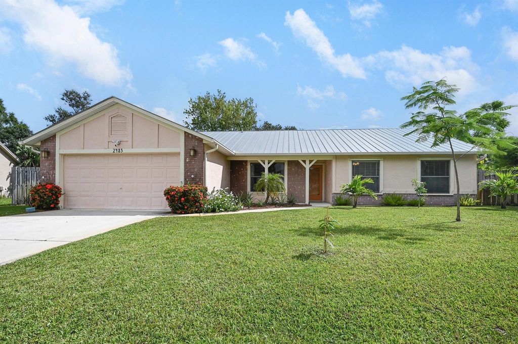 Photo of 2485 SE Tracy Avenue, Port Saint Lucie, FL 34952 (MLS # R11063115)