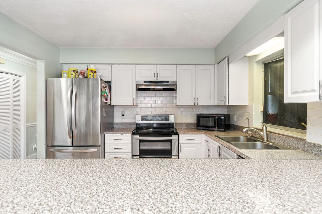 Photo of 1452 SW 26th Avenue SW #A, Boynton Beach, FL 33426 (MLS # B26021118)