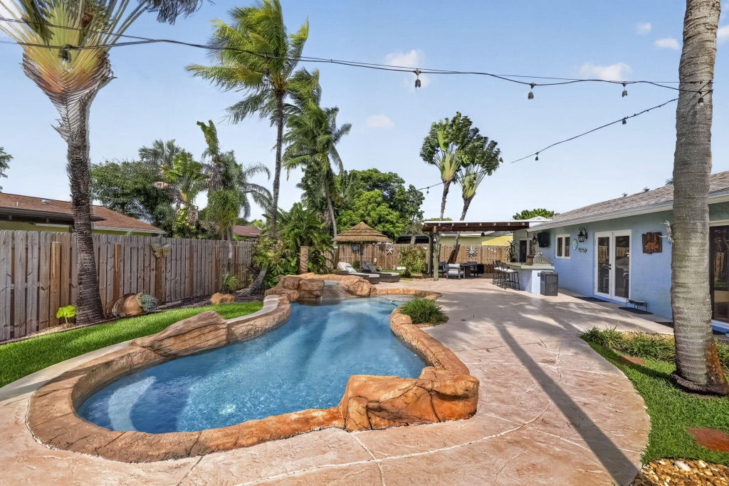 Photo of 6801 NW 21ST Terrace, Fort Lauderdale, FL 33309 (MLS # B26093528)