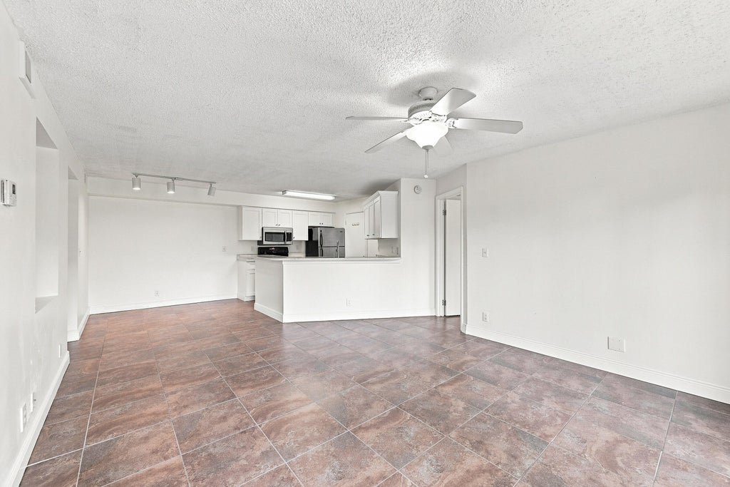 Photo of 9999 SUMMERBREEZE Drive #417, Sunrise, FL 33322 (MLS # B26060176)