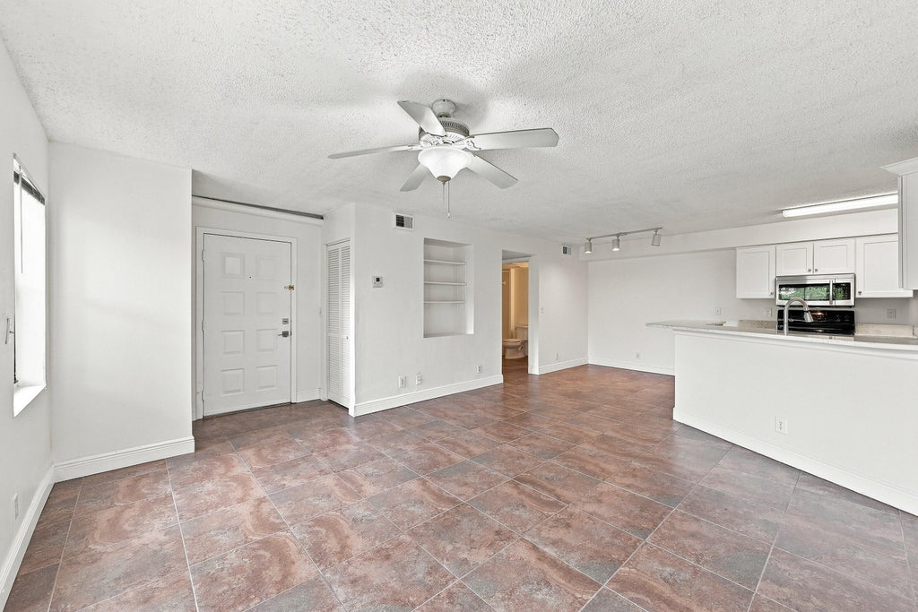 Photo of 9999 SUMMERBREEZE Drive #417, Sunrise, FL 33322 (MLS # B26060176)