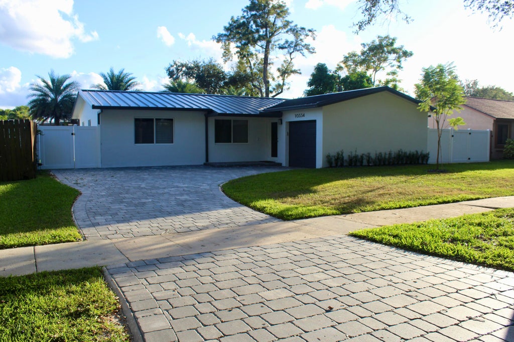 Photo of 10334 SW 50th Street, Cooper City, FL 33328 (MLS # B26091681)