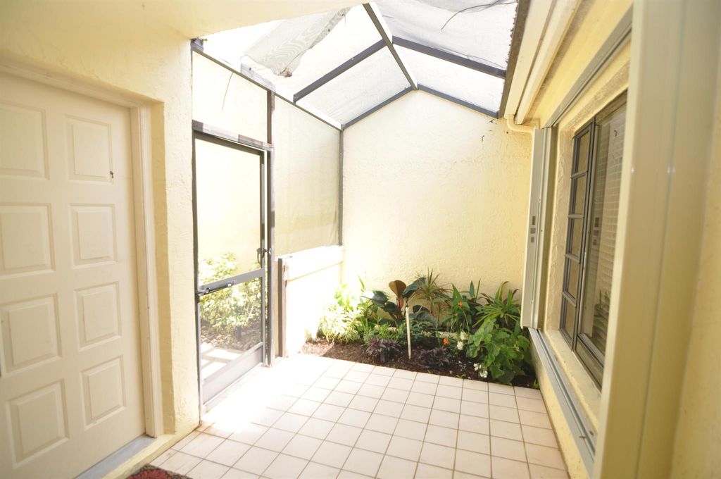 Photo of 9 Edinburgh Drive, Palm Beach Gardens, FL 33418 (MLS # R11092676)