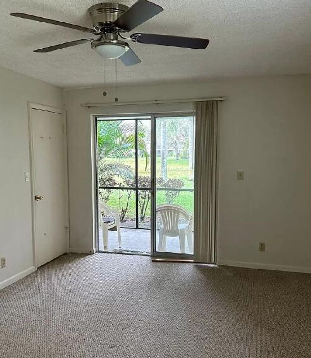 Photo of 6515 Chasewood Drive #C, Jupiter, FL 33458 (MLS # R10964522)