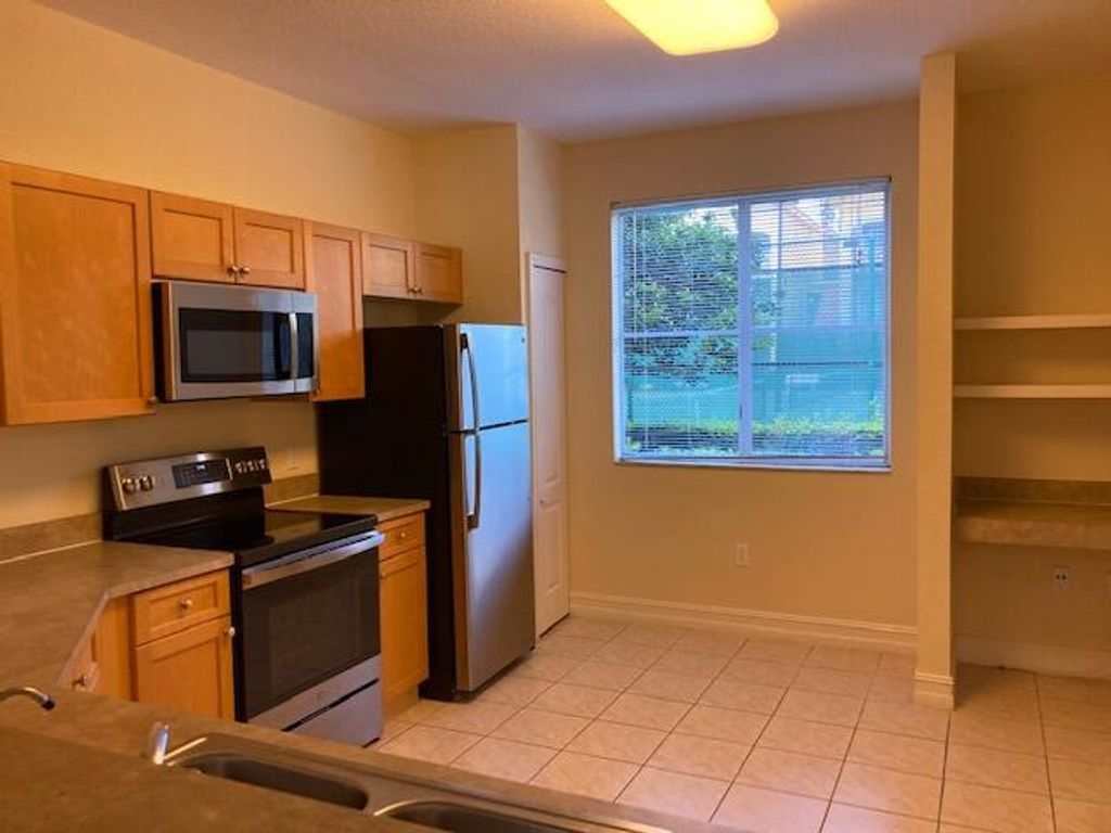 Photo of 11020 Legacy Drive #104, Palm Beach Gardens, FL 33410 (MLS # R10806808)