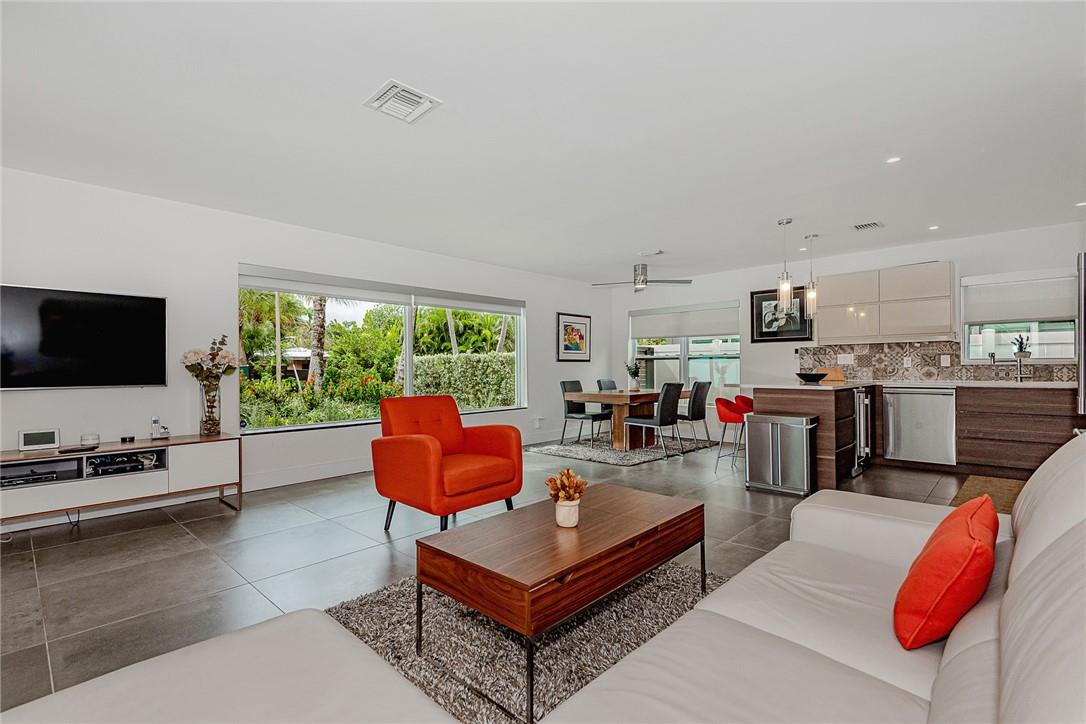 Welcome home! Relax in this fully furnished beautifully remodeled 3/2 modern home with not a detail spared and views of the beach from your very own front yard. Sitting on just under 10,000sqft of land, this home is well equipped & tastefully decorated with top-of-the-line upgrades throughout, stainless steel appliances, wine fridge, King bed and 2 Queen beds, TVs in all rooms, beautiful Italian Porcelain floors, and impact windows throughout. Huge backyard with outdoor grill, garage, beach equipment and outdoor shower. Guest House available for additional $1,500/month.