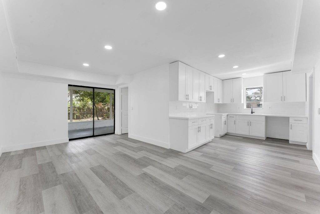 Photo of 700 NW 2nd Terrace, Deerfield Beach, FL 33441 (MLS # R11128042)