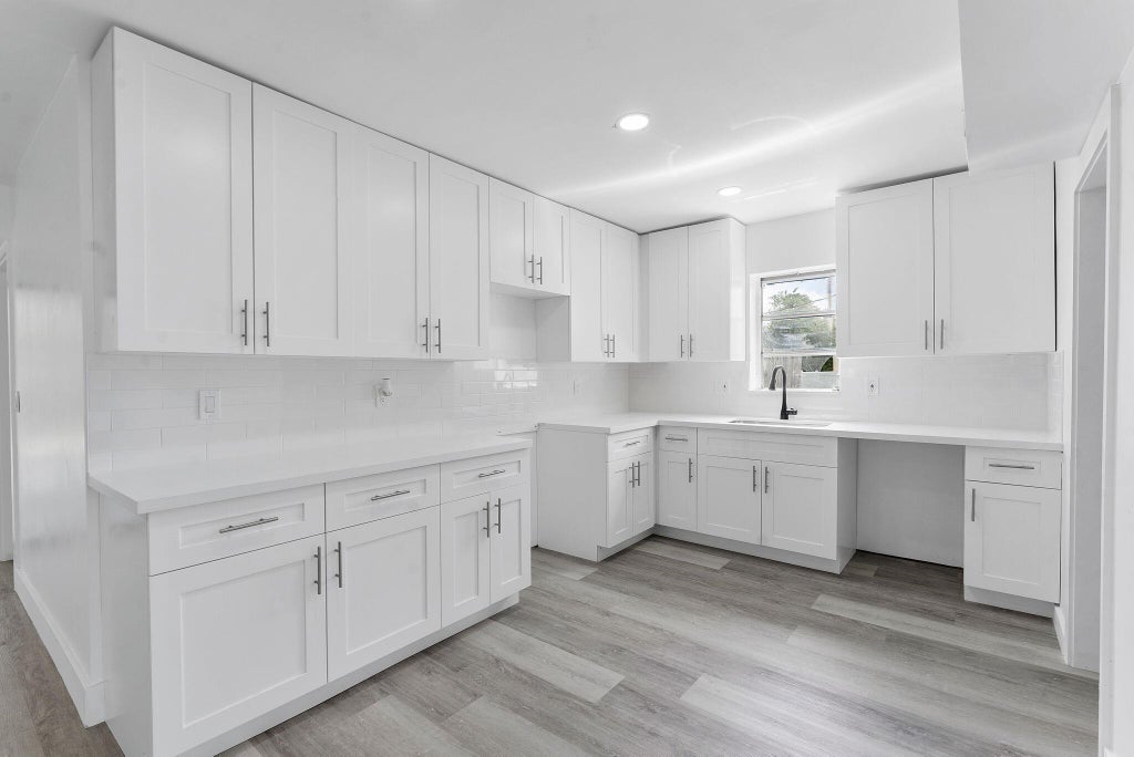 Photo of 700 NW 2nd Terrace, Deerfield Beach, FL 33441 (MLS # R11128042)