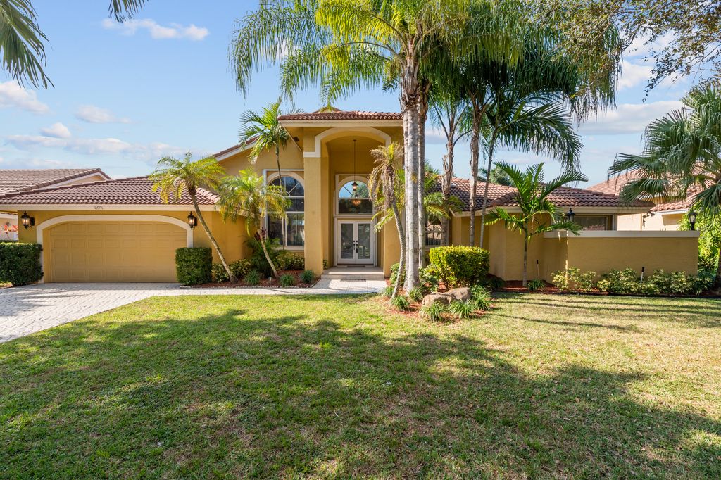 Photo of 6051 NW 60th Avenue, Parkland, FL 33067 (MLS # B26018034)