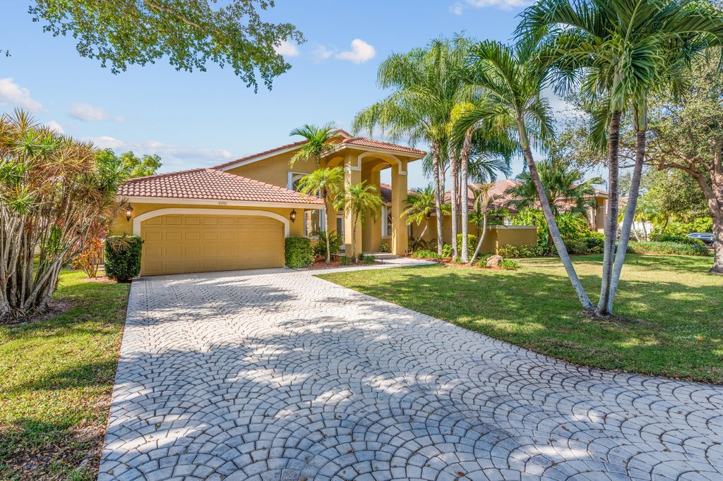 Photo of 6051 NW 60th Avenue, Parkland, FL 33067 (MLS # B26018034)