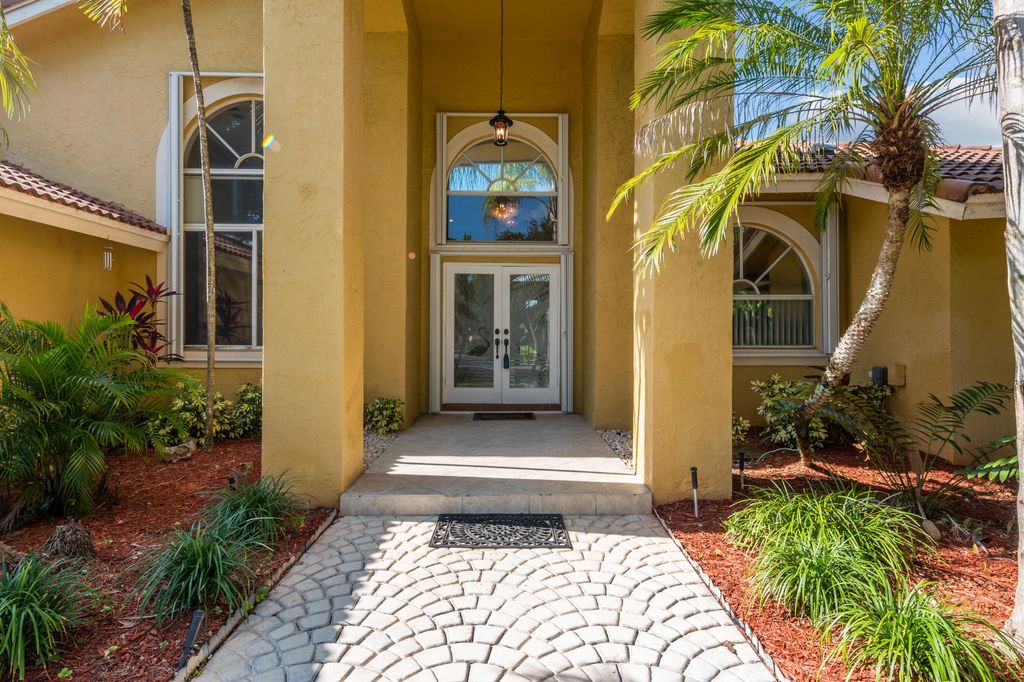 Photo of 6051 NW 60th Avenue, Parkland, FL 33067 (MLS # B26018034)