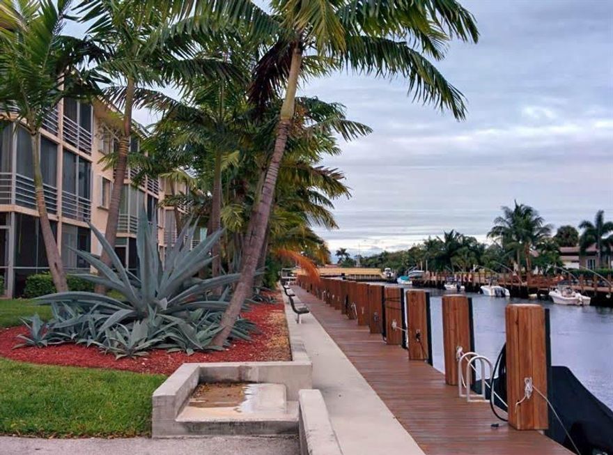 South Florida gem in Lighthouse Point waterfront community! Priced to sell! All ages welcome! This spacious 2 bedroom, 2 bathroom condo features walk in closets and a screened in patio with rear door to the courtyard, clubhouses and heated pool. This condo community offers ocean access with dock allowing for boats up to 25 ft. Two club houses include a gym, pool table, wifi, BBQ area and shuffleboard. Enjoy the South Florida life style Minutes away to shopping, restaurants and beaches. Don't miss this great opportunity, won't last!