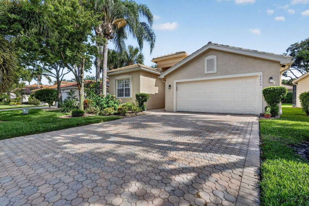 Photo of 6602 CAMARILLO TERRACE Lane, Delray Beach, FL 33446 (MLS # B26069970)