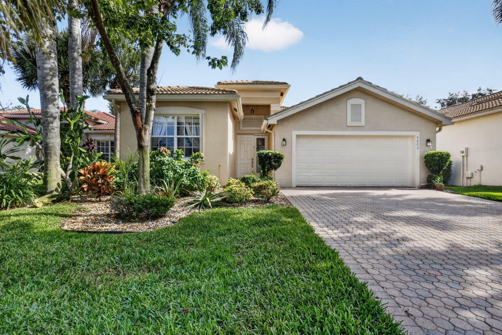 Photo of 6602 CAMARILLO TERRACE Lane, Delray Beach, FL 33446 (MLS # B26069970)