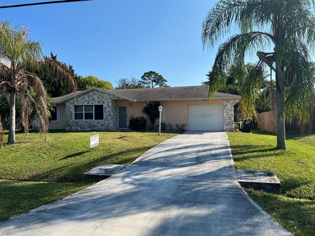 Photo of 1107 SW Addie Street, Port St Lucie, FL 34983 (MLS # R10956414)