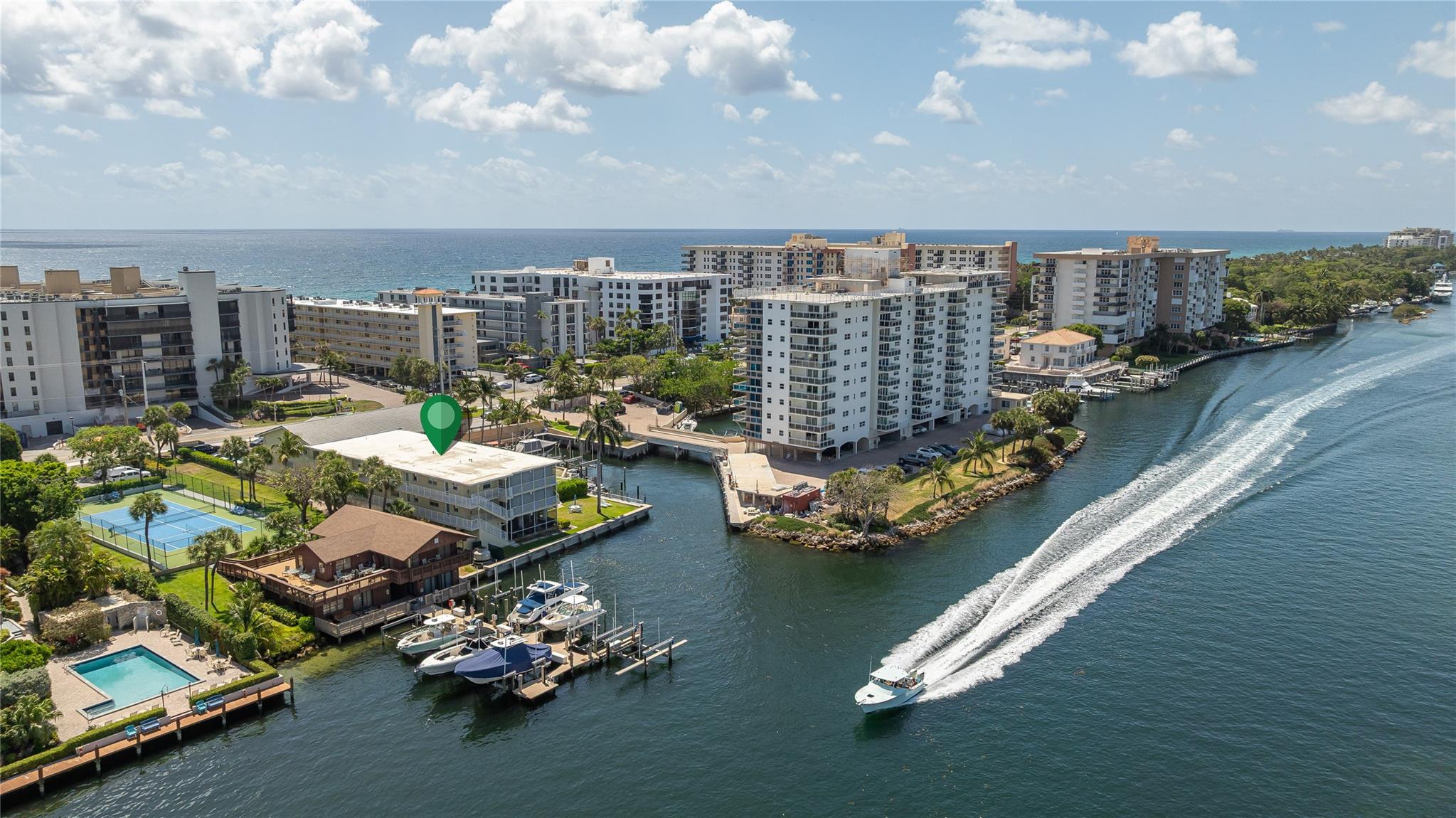 Along the captivating coastal drive known as Millionaire Mile in Hillsboro Beach on A1A, you'll find an area, both bustling with activity & quiet tranquility alike. Condo residence offers a beautifully positioned intracoastal waterfront vantage along with private deeded beach access. 2 story bldg with heated community pool & area grounds that cascade to your water views of passing yachts to the sea while you lounge. 2bed/2bath, 2nd floor residence provides lovely natural light, spacious screened balcony, freshly painted interior, crown molding, guest bath jacuzzi tub, full size W/D, impact front doors/shutters. Pet friendly, storage locker. Condo fees $700 per mo. 40 yr recertification completed. Hillsboro Beach nestled 10 min to Ft Lauderdale, 20 min to Boca. Welcome to your coastal oasis