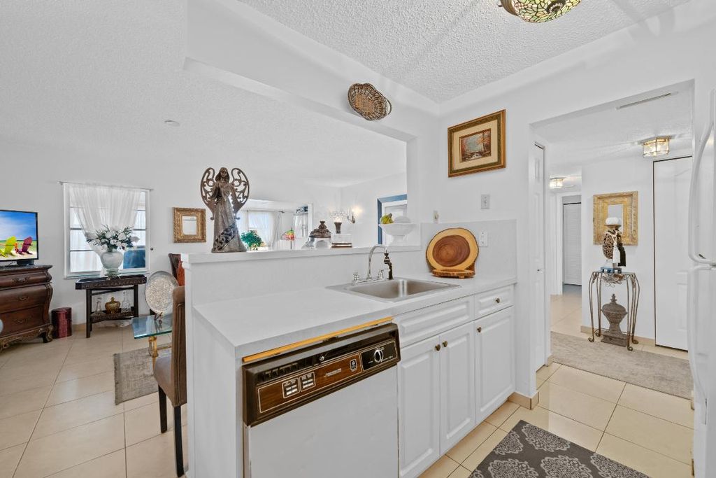 Photo of 5180 E Sabal Palm Boulevard #338, Tamarac, FL 33319 (MLS # R11154430)